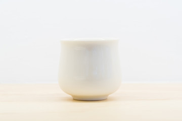 Asian ceramics tea cup on white background
