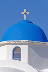 dome of church in Akrotiri over blue sky, Santorini