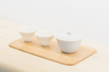 Fototapeta na wymiar Asian ceramics tea cup on white background 
