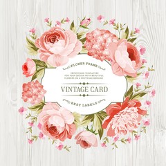 Pink peony with a vintage label over wooden texture. Vector illustration. © Kotkoa