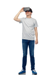 happy man in virtual reality headset or 3d glasses