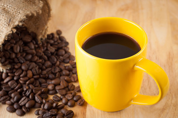 cup of coffee and coffee beans