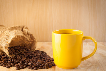 cup of coffee and coffee beans