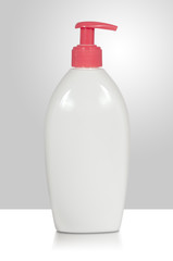 bottle of liquid soap on white background