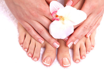 Closeup photo of a female feet at spa salon on pedicure procedure