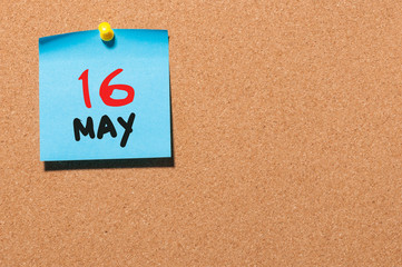May 16th. Day 16 of month, calendar on cork notice board, business background. Spring time, empty...