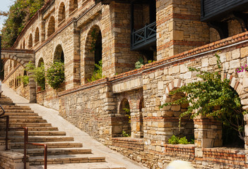 Obraz premium street with cobblestone steps and old houses