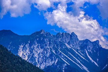 dramatic picture with mountain peak in alps