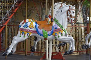 Fototapeta na wymiar white carousel horse