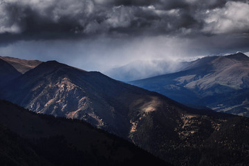 Stormy and dramatic clouds over the Caucasus mountains Arkhyz, Russia