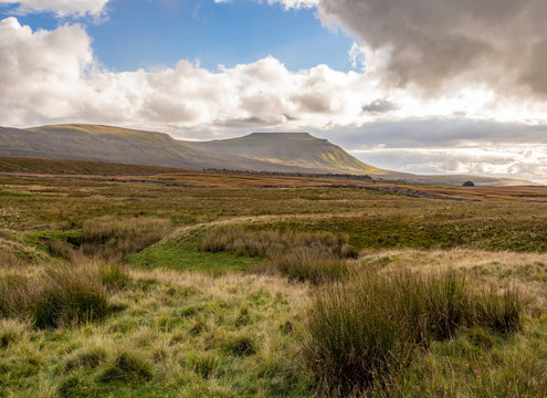 Approaching storm and rain over Ingleborough at Ribblehead, Settle, North Yorkshire, UK