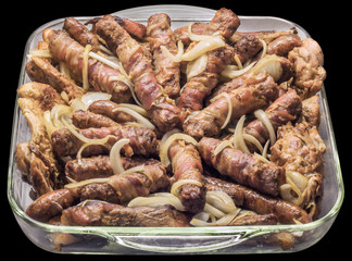 Dish of Grilled Minced Meat Loafs Cevapcici with Chopped Onion Isolated on Black Background