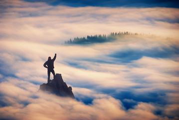 Obraz na płótnie Canvas Standing on the top of mountain