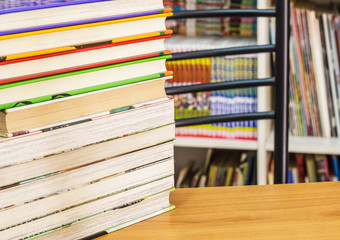 Books on wooden table.