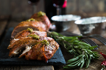 Roast pork tenderloin with herbs and red wine