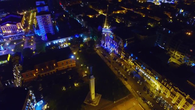Flying over night Batumi City Georgia downtown 4k travel aerial video. Nighty Europe square, old town, Statue of Medea