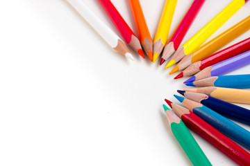 Colored pencils isolated on white background.