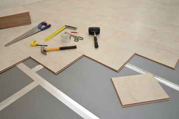 Installing New Laminate Wood Flooring Abstract, text for copy sp