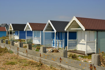 Fototapeta na wymiar Beach huts at Lancing, Sussex, England