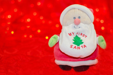 My first Santa on red bokeh background