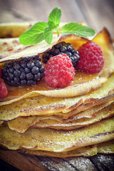 Pancake - Crepes with berries, mint and honey 