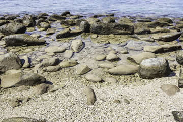 Fototapeta na wymiar Rocks on the beach.