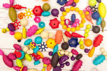 Fototapeta na wymiar colorful plastic toys for kids, shape of coral,shellfish,pearl etc