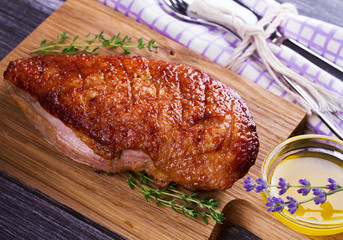 Duck breast, lavender honey and thyme, served on chopping board