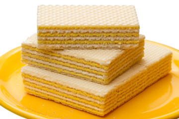 Waffles on yellow plate