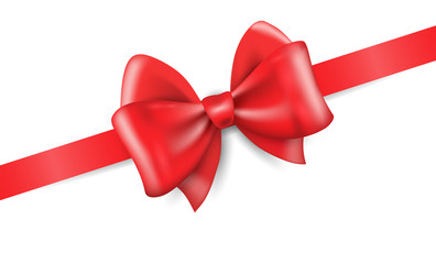 Big red holiday bow on white background