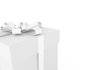 White gift box with white ribbon bow