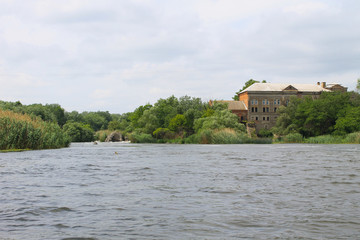 Fototapeta na wymiar Old water mill in Migeya village, Ukraine
