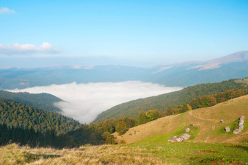 Naklejka premium Foggy mountain landscape