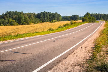 Fototapeta na wymiar Empty turning rural highway