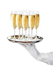 Elegant waiter serving champagne on a tray