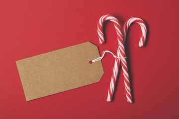 Festive candy canes with a blank label