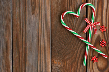 Christmas cane on wooden background