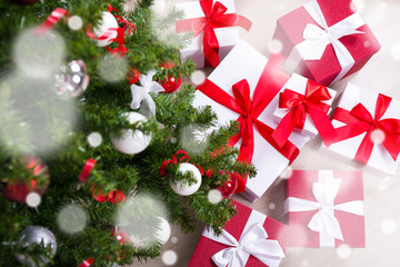close up of decorated Christmas tree and presents
