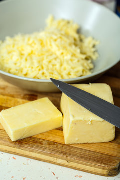 Cheddar cheese sliced and shredded