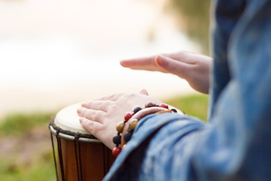 Playing the djembe