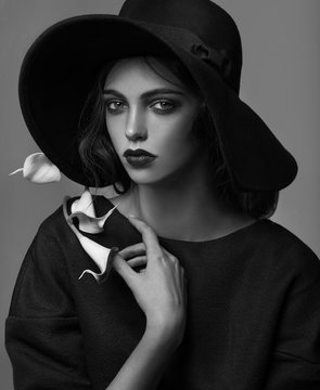 Portrait of elegant woman wearing hat 