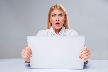 Young businesswoman working at laptop computer