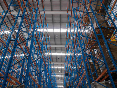 construction of blue and red shelf in warehouse