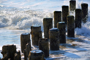 Old Wooden Beach Pier at Sunrise on a Summer Morning