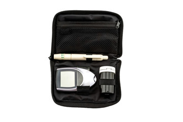 blood glucose meter, the blood sugar value is measured on a finger pack in black case on white background.Saved with clipping path.