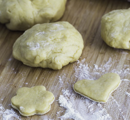 Homemade heart/flower shaped pastry on the wooden board