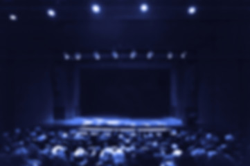 Audience in a theater, on a concert and applauding blurred © ugljesaras