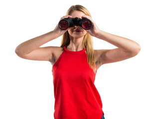 Blonde girl with binoculars