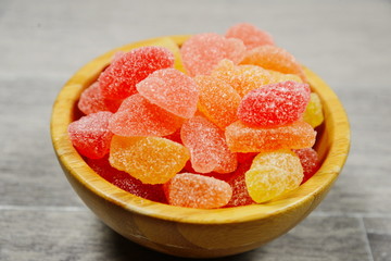 Gummy Bear Candy Colorful Background on wood