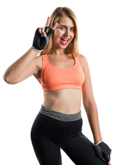 Sport woman doing victory gesture